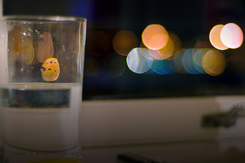 water glass on windowsill photo