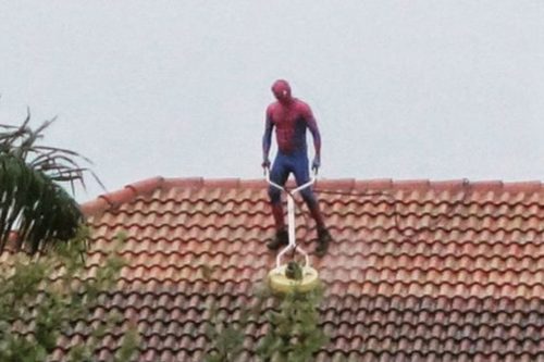 ‘Spider-Man’ Was Spotted Pressure-washing A Roof During A Rainstorm