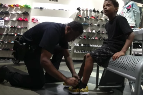 This Police Officer Will Buy A New Pair Of Shoes For Kids Who Can Score A Basket On Him