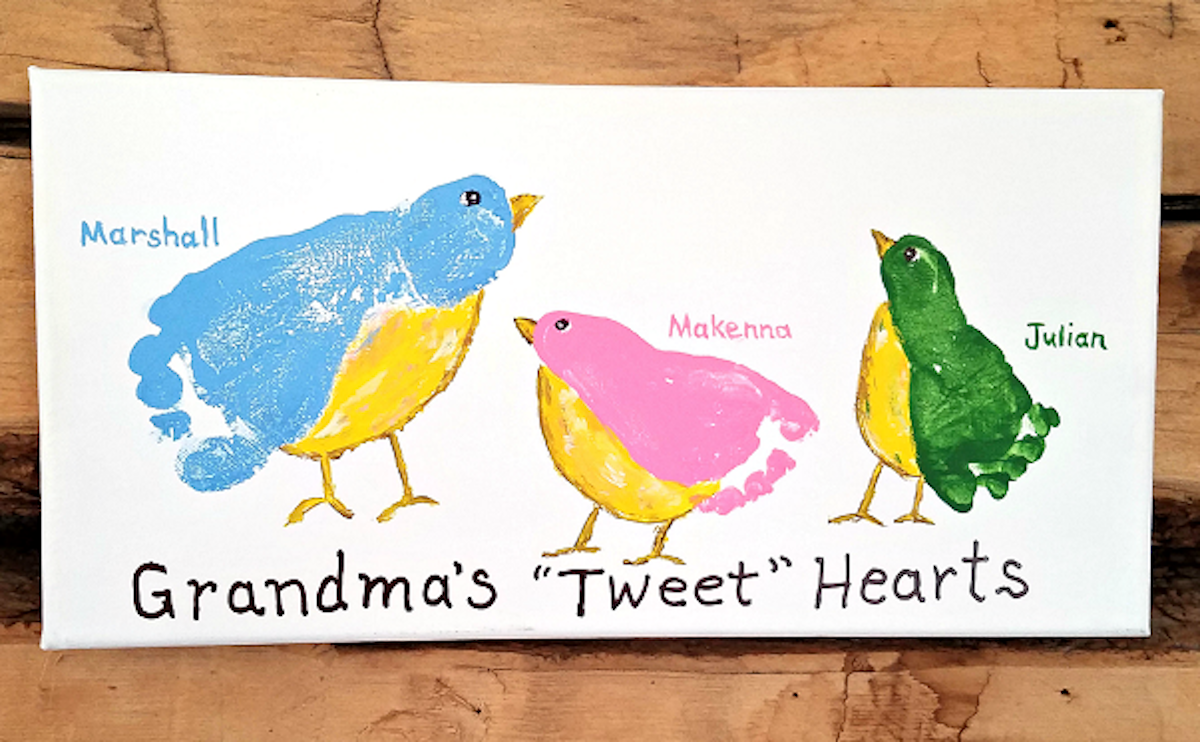 Make adorable painted birds out of your kids' footprints