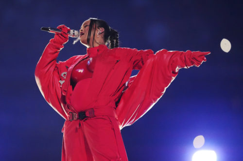 Rihanna reveals baby bump in Super Bowl halftime performance