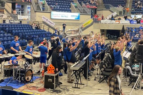 Rival high school steps in for missing basketball team’s band