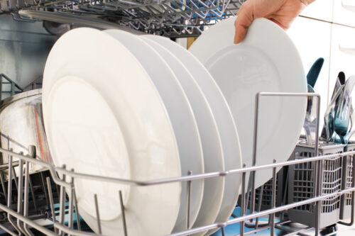 Do you save more water using a dishwasher or hand-washing dishes?