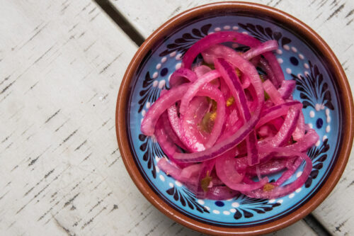 Quick-pickled onions are an easy way to brighten up any dish