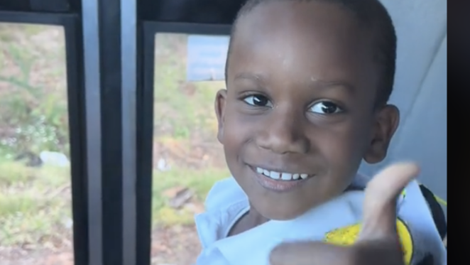 Kindergartners cheer for classmate as he sprints home from the bus every day after school